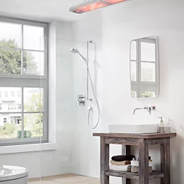 Heatscope Vision 3200W Radiant Heater brings sleek electric heating to a private residential bathroom with minimalist white ceramic glass for energy-efficient warmth.