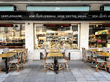 Heatscope Vision 3200W Radiant Heater provides discreet ceiling-mounted infrared warmth for an indoor restaurant dining space.